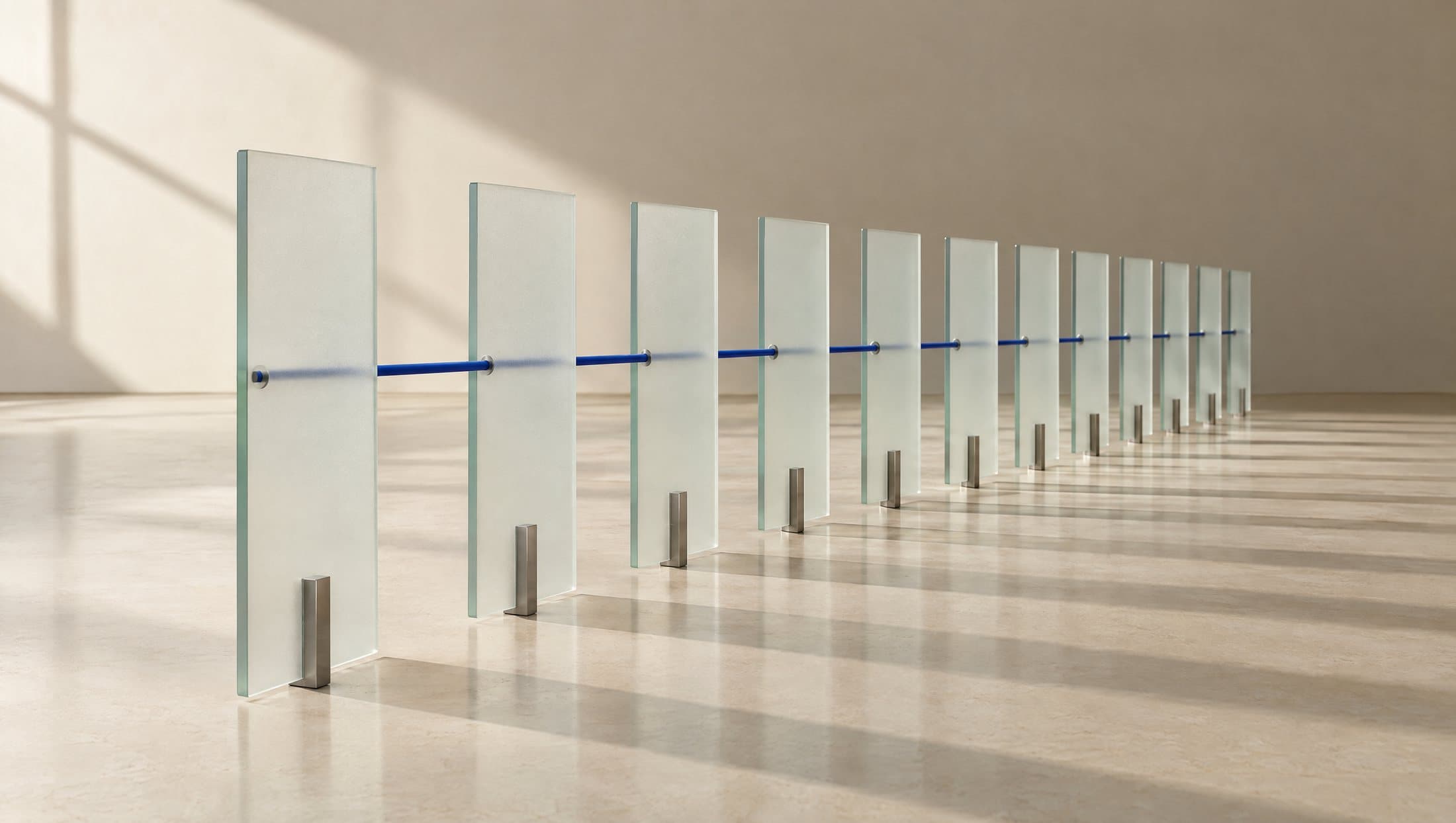 A row of frosted glass planes receding in perspective, joined by a thin cobalt rod.